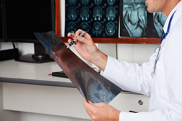 Image showing Radiologist Holding X-ray