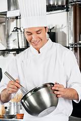Image showing Chef With Wire Whisk And Mixing Bowl