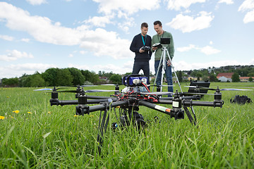 Image showing UAV Octocopter And Technicians At Park