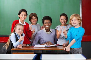 Image showing Happy Teacher And Schoolchildren