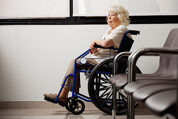 Image showing Pensive Elderly Woman On Wheelchair