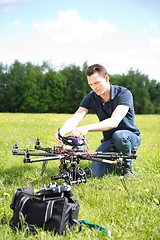 Image showing Engineer Fixing UAV Drone