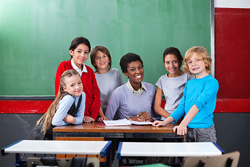 Image showing Happy Teacher And Schoolchildren