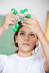 Image showing Schoolgirl Looking At Molecular Structure