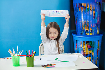 Image showing Girl Showing Drawing In Classroom