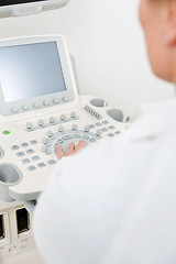 Image showing Female Doctor Using Ultrasound Machine