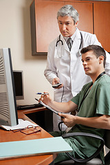 Image showing Technician And Doctor Working At Clinic