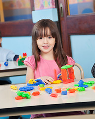 Image showing Girl Playing With Construction Blocks In Preschool