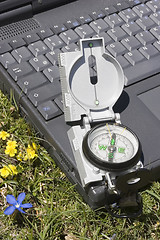 Image showing Compass and laptop