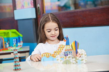 Image showing Girl Playing With Craft In Classroom