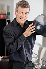Image showing Male Hairstylist With Steamer At Salon