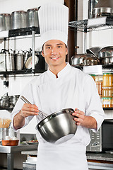 Image showing Male Chef With Wire Whisk And Mixing Bowl