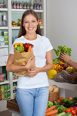 Image showing Young Woman With Vegetable Bag