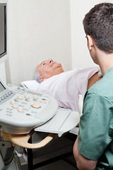 Image showing Senior male abdomen ultrasound in clinic