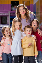 Image showing Young Teacher With Children In Kindergarten