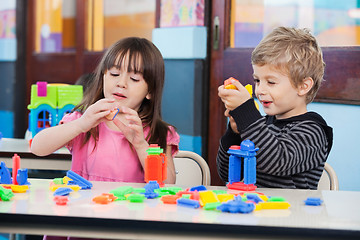 Image showing Children Playing With Blocks In Classroom