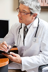 Image showing Mature Male Doctor In Clinic