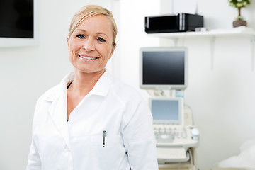 Image showing Smiling Gynecologist With Ultrasound Machine