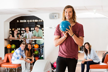 Image showing Man Ready With Bowling Ball in Club