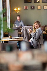 Image showing Pregnant Woman Drinking Coffee At Cafe