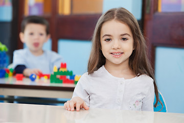 Image showing Girl With Friend In Background At Preschool