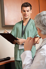 Image showing Technician With Doctor At Clinic