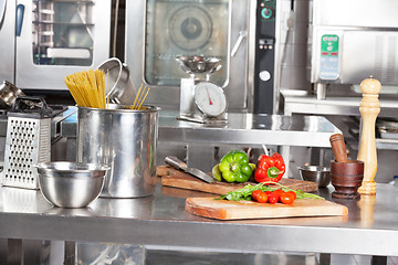 Image showing Spaghetti Pasta And Bell Peppers On Kitchen Counter