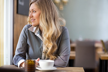 Image showing Woman With Coffee Cup At Coffeeshop