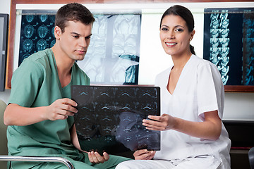 Image showing Medical Technicians Analyzing MRI X-ray