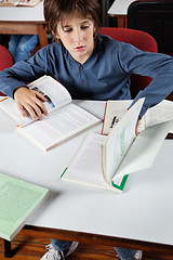Image showing Schoolboy Studying In Library