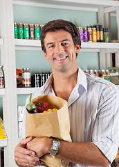 Image showing Man With Vegetable Bag In Grocery Store