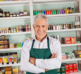 Image showing Senior Male Owner Smiling At Supermarket