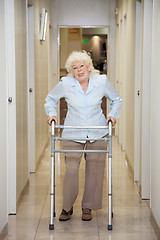 Image showing Elderly Woman With Walker In Hospital Corridor