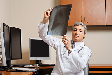 Image showing Radiologist Holding Shoulder X-ray