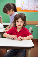 Image showing Little Boy With Clay At Kindergarten