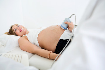 Image showing Woman Getting Ultrasound Scan From Obstetrician