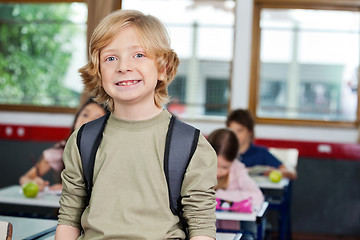 Image showing Happy Schoolboy With Classmates Studying In Background