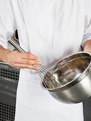 Image showing Chef With Wire Wisk And Mixing Bowl