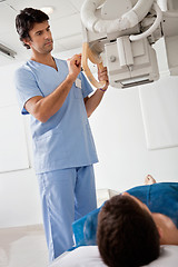 Image showing Technician Taking Patient's X-ray