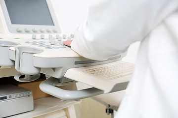 Image showing Gynecologist Using Ultrasound Machine