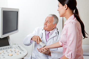 Image showing Radiologist Scanning Female Patient's Hand