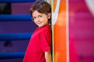 Image showing Boy Standing Against Wall In Kindergarten