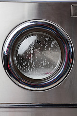 Image showing Washing Machine With Foam On Front Load