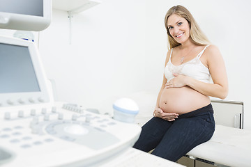 Image showing Happy Pregnant Woman By Ultrasound Machine