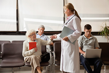 Image showing Doctor Holding Senior Woman's Hand