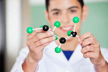 Image showing Schoolboy Examining Molecular Structure In Lab