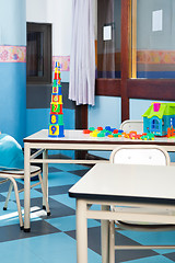 Image showing Colorful Construction Blocks And House On Desk