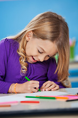 Image showing Girl With Sketch Pen Drawing In Kindergarten