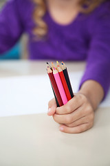 Image showing Girl Holding Of Colored Pencils In Classroom