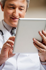 Image showing Doctor Using Digital Tablet